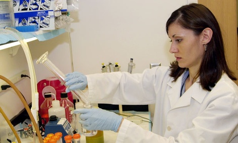 A biological technician works at a lab at the Centers for Disease Control
