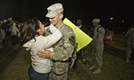 Gerald Kowalski hugs his wife Lisa as he returns home. Gerald Kowalski hugs his wife Lisa as he returns home.