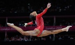 U.S. gymnast Gabrielle Douglas performs on the balance beam at the 2012 Summer Olympics.