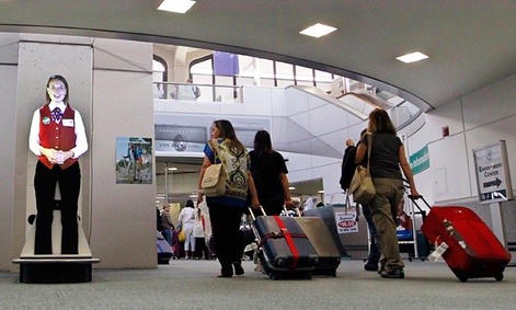 Ava the avatar helps travelers at the Newark Liberty International Airport on July 27.