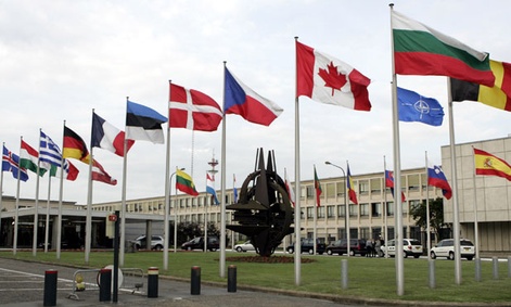 Flags fly at NATO headquarters in Brussels.