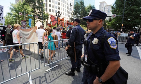 Charlotte police officers monitor a protest over the weekend.