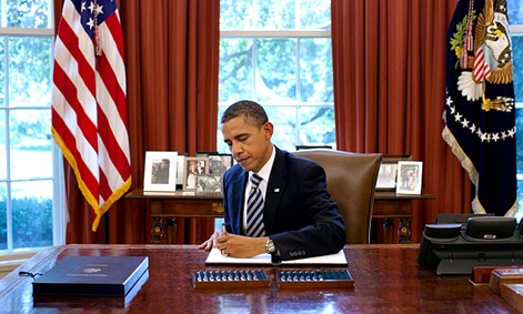 President Obama signs the Budget Control Act of 2011.