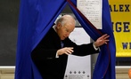 Vice President Joe Biden exits a voting booth after casting his ballot in Greenville, Del.
