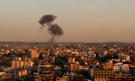 Smoke rises following an Israeli attack on Gaza City, Thursday, Nov. 15, 2012. 