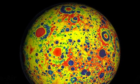 A gravitational map of the moon, depicting newly quantified lunar mass: Red indicates more massive areas and blue indicates less mass. 