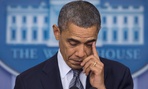 Obama wiped away tears before he spoke Friday.
