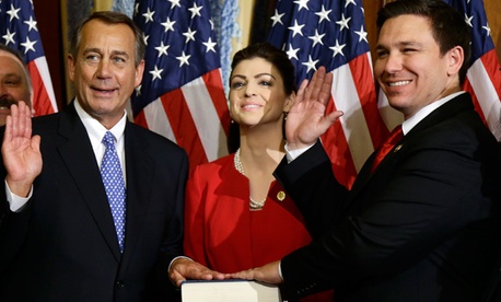 House Speaker John Boehner of Ohio performs a mock swearing in for Rep. Ron DeSantis, R-Fla. House Speaker John Boehner of Ohio performs a mock swearing in for Rep. Ron DeSantis, R-Fla.