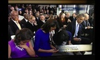Distractions abound: In an image from the inauguration, the entire Obama family is seen using their smartphones.