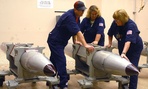 Technicians at the Pantex Plant in Texas ready a B-61 nuclear gravity bomb for a 2007 surveillance test.