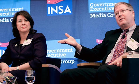 National Reconnaissance Office CIO Jill Singer, left, and CIA Chief Information Officer Gus Hunt at a forum hosted by Nextgov and INSA