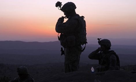 Solders patrol in the mountains near Sar Howza, Paktika province, Afghanistan. The Army is 