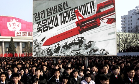 North Koreans attend a rally to support a statement given on Tuesday by a spokesman for the Supreme Command of the Korean People's Army vowing to cancel the 1953 cease-fire that ended the Korean War.