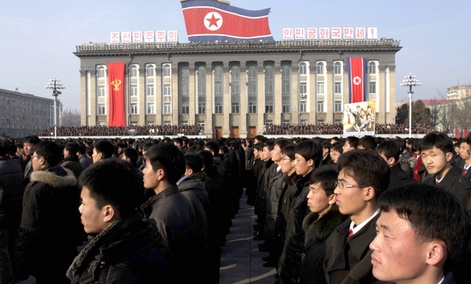 North Koreans attend a rally in support of a statement by a spokesman for the Supreme Command of the Korean People's Army vowing to cancel the 1953 cease-fire that ended the Korean War.