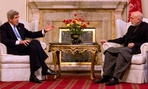 Secretary of State John Kerry meets with Afghan President Hamid Karzai at the Presidential Palace in Kabul.