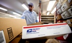 Packages wait to be sorted in a Post Office 