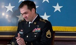 Staff Sgt. Clinton Romesha won the Medal of Honor earlier this year and is throwing the ceremonial first pitch at Nationals Park on Monday.