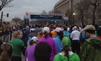 The Rock N' Roll Marathon gets underway the morning of March 16 under threatening skies on Constitution Ave in Washington, D.C. The Department of Commerce building is at right. 