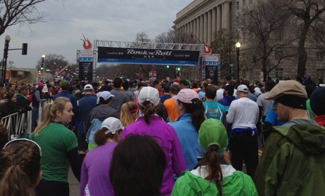 The Rock N' Roll Marathon gets underway the morning of March 16 under threatening skies on Constitution Ave in Washington, D.C. The Department of Commerce building is at right. 