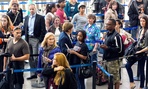 Travelers stand in a long line at Los Angeles International Airport Monday.