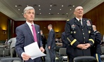 Army Secretary John McHugh, left, and Army Chief of Staff Gen. Ray Odierno, arrive on Capitol Hill  to testify for the hearing on the Defense Department budget requests for Fiscal 2014