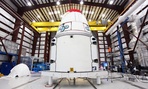 The SpaceX Dragon spacecraft inside a processing hangar at Cape Canaveral Air Force Station in Cape Canaveral, Fla. 