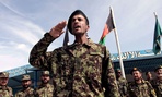 A graduate gestures during a graduation ceremony in Herat, Afghanistan in April.