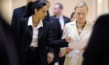 Huma Abedin, left, aide to former Secretary of State Hillary Rodham Clinton, right.