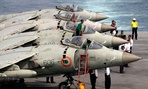 Indian Navy's Supersonic Sea Harriers fighter aircrafts are prepared for a display during an exercise on board Indian Navy vessel INS Virat in the Arabian Sea. 