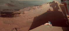 Mars Rover Opportunity catches its own late-afternoon shadow in a view eastward across Endeavour Crater on Mars.