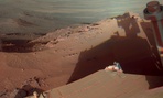 Mars Rover Opportunity catches its own late-afternoon shadow in a view eastward across Endeavour Crater on Mars.