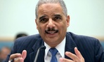 Attorney General Eric Holder gestures while testifying on Capitol Hill in Washington. Attorney General Eric Holder gestures while testifying on Capitol Hill in Washington.