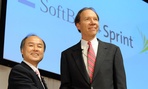 Son Masayoshi, left, president of Softbank Corp. shakes hands with Dan Hesse, CEO of Sprind Nextel Corp. Son Masayoshi, left, president of Softbank Corp. shakes hands with Dan Hesse, CEO of Sprind Nextel Corp.