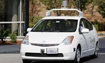 One of Google's driverless cars in action, a product of the company's X-lab One of Google's driverless cars in action, a product of the company's X-lab