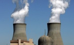 Steam rises from the cooling towers of nuclear reactors at Plant Vogtle, in Waynesboro, Ga. 