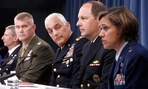 Air Force Brig. Gen. Gina M. Grosso, right, speaks during a news conference at the Pentagon, Tuesday, June 18, 2013, to discuss women in combat. 