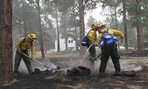Soldiers from the 1157th Engineer Firefighter Company, Colorado National Guard, smother hot spots near Colorado Springs. Soldiers from the 1157th Engineer Firefighter Company, Colorado National Guard, smother hot spots near Colorado Springs.