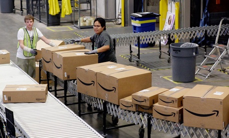 Workers sort boxers at an Amazon warehouse in 2009. Workers sort boxers at an Amazon warehouse in 2009.