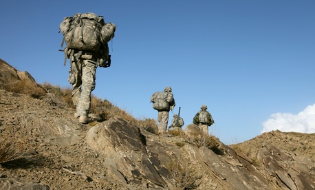 Soldiers patrol in the mountains near Sar Howza, Afghanistan in 2009. Soldiers patrol in the mountains near Sar Howza, Afghanistan in 2009.