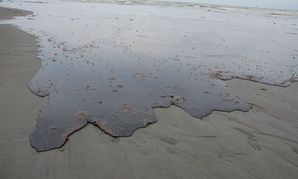 Oil approaches the Louisiana shore in 2010 after the spill. 