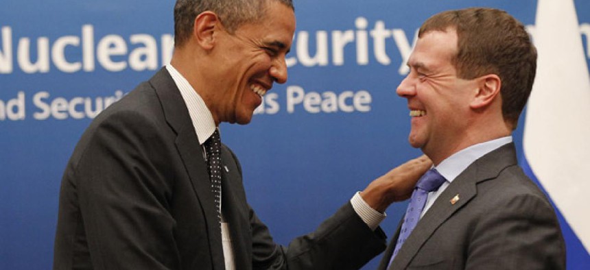 Barack Obama greets  Russian President Dmitry Medvedev at the summit.
