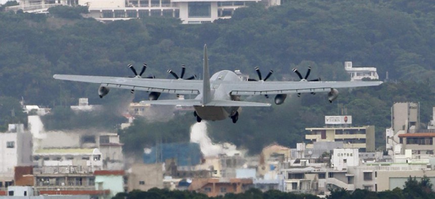 A transport plan flies into a base in Okinawa.