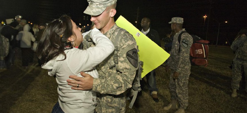 Gerald Kowalski hugs his wife Lisa as he returns home. 