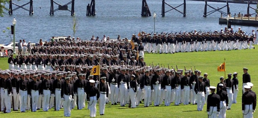  Midshipmen march onto Worden Field at the United States Naval Academy in Annapolis, Md. for the annual Commissioning Week Color Parade in 2009.