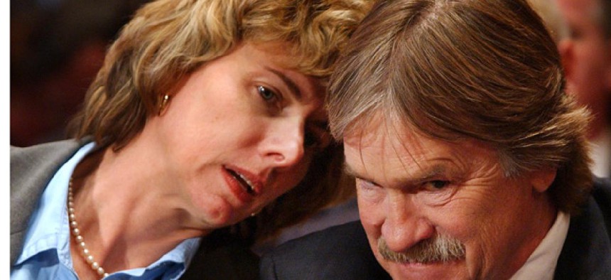 Robert Loux listens to NRC nominee Allison MacFarlane at a hearing in 2006.