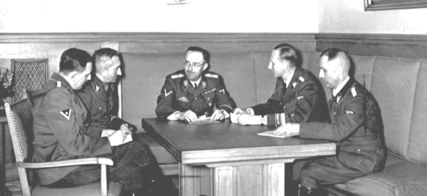 The actual Gestapo leadership in Germany in 1939. From left to right are Franz Josef Huber, Arthur Nebe, Heinrich Himmler, Reinhard Heydrich and Heinrich Müller. 