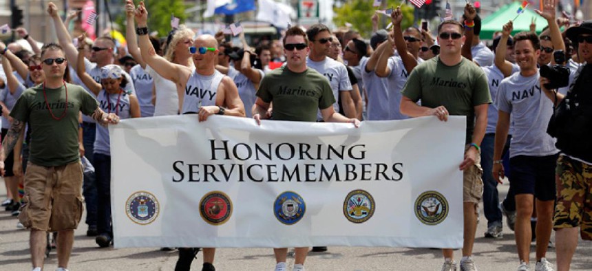 Service members march in the 2011 Gay Pride Parade in San Diego.