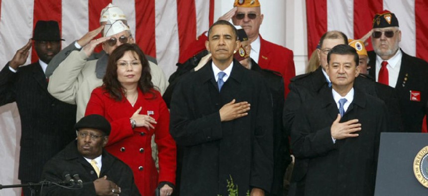 President Obama flanked by VA Secretary Eric Shinseki and Assistant VA Secretary Tammy Duckworth.