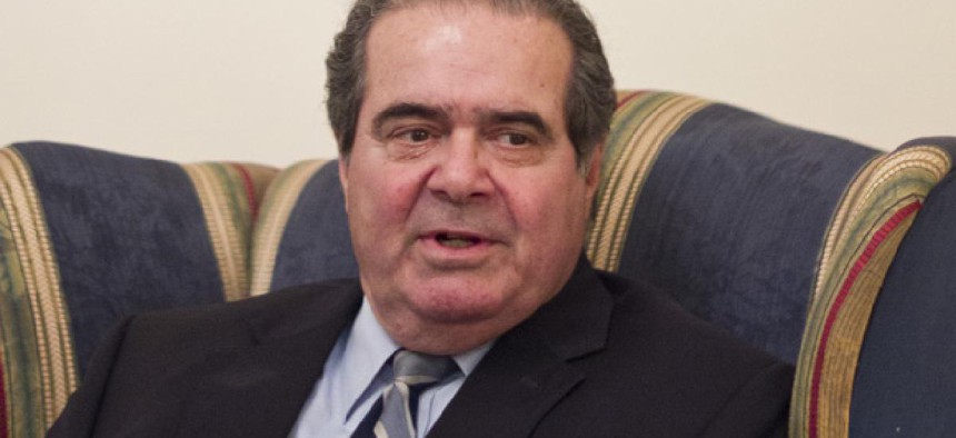Antonin Scalia said gun control "will have to be decided in future cases." 