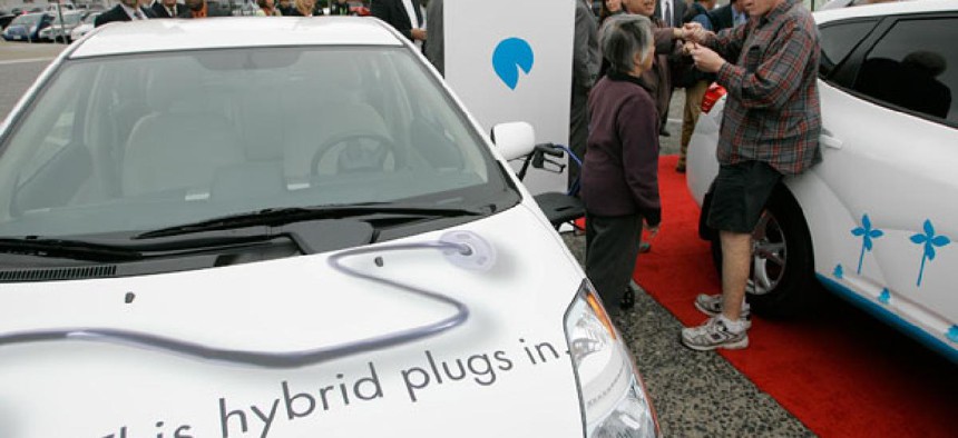 An electric car refuels at a charging station in San Francisco.